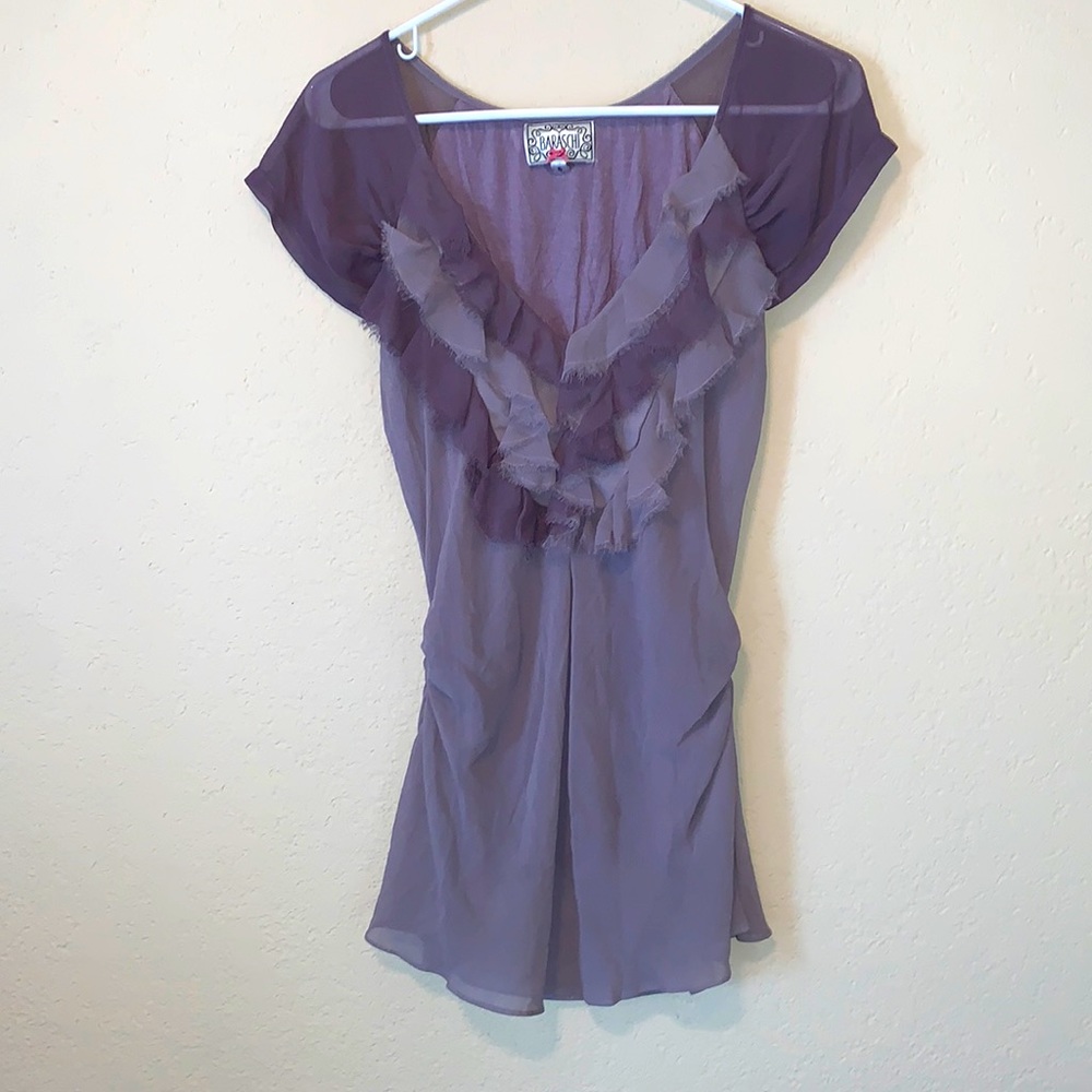 Ruffled two tone purple top.